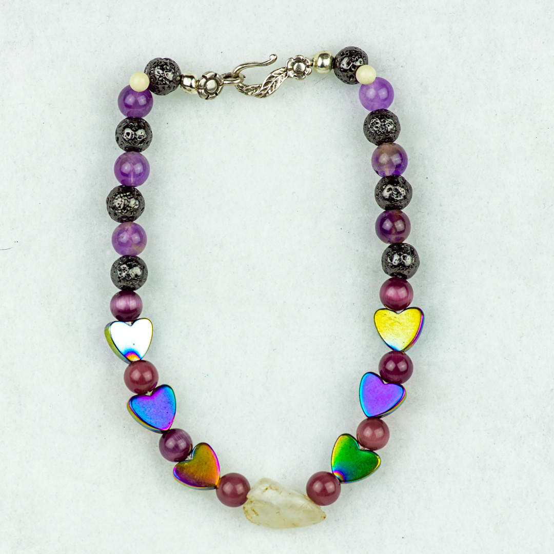 Purple Cats Eye, Hematite, Black Lava Stone and Onyx Beaded Bracelet with Naturally Formed Moonstone Bead